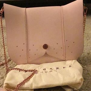 Ted Baker pink bag.